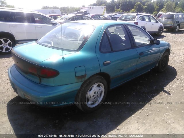 1G2JB524XT7525854 - 1996 PONTIAC SUNFIRE SE BLUE photo 4