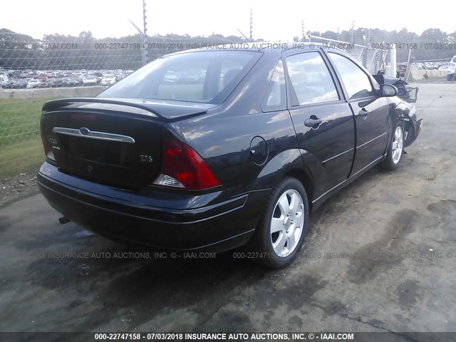 1FAFP38382W231272 - 2002 FORD FOCUS ZTS BLACK photo 4