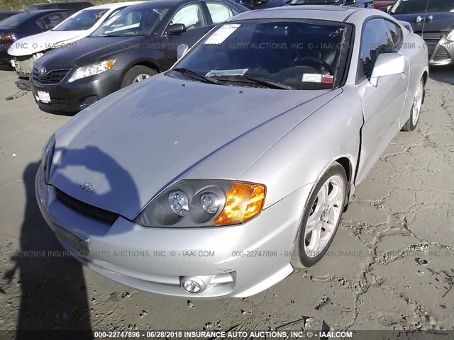 KMHHN65FX4U134769 - 2004 HYUNDAI TIBURON GT SILVER photo 2