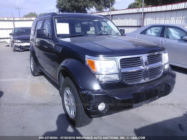 1D4PT2GKXBW506835 - 2011 DODGE NITRO SE BLACK photo 1