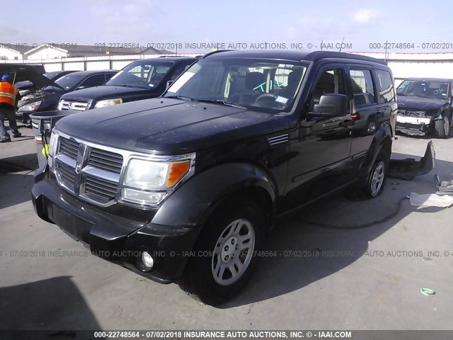 1D4PT2GKXBW506835 - 2011 DODGE NITRO SE BLACK photo 2