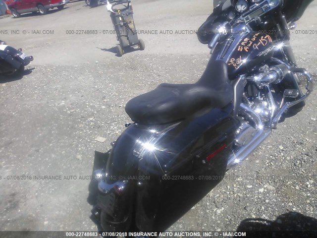 1HD1KB41XAB625121 - 2010 HARLEY-DAVIDSON FLHX BLACK photo 4