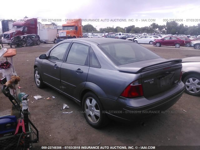 1FAFP34N67W130052 - 2007 FORD FOCUS ZX4/S/SE/SES GRAY photo 3