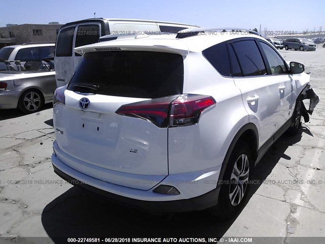 JTMZFREV5JJ726141 - 2018 TOYOTA RAV4 LE WHITE photo 4