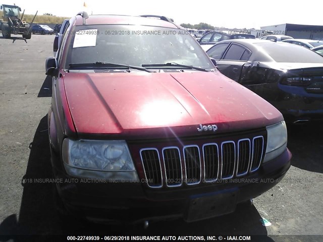 1J8GW68J42C266709 - 2002 JEEP GRAND CHEROKEE OVERLAND RED photo 6