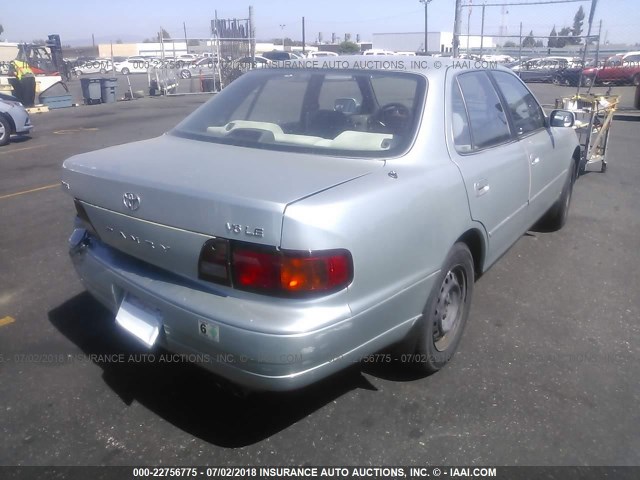 JT2BF12K2T0170627 - 1996 TOYOTA CAMRY LE/XLE/SE ღია ლურჯი ფოტო 4