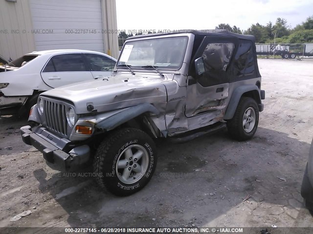 1J4FA29P9YP729811 - 2000 JEEP WRANGLER / TJ SE SILVER photo 2