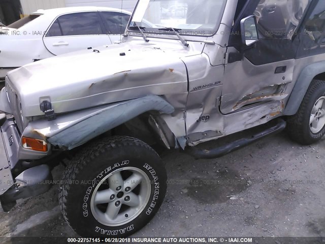 1J4FA29P9YP729811 - 2000 JEEP WRANGLER / TJ SE SILVER photo 6