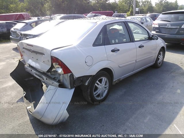 1FAFP34Z74W150681 - 2004 FORD FOCUS SE COMFORT/SE SPORT GRAY photo 4