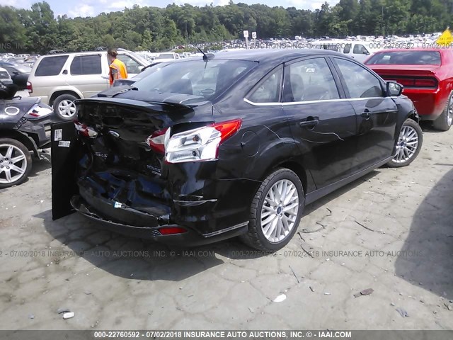 1FADP3J28EL309208 - 2014 FORD FOCUS TITANIUM BLACK photo 4