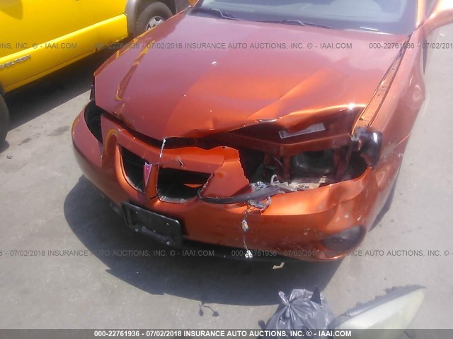 2G2WS522541218319 - 2004 PONTIAC GRAND PRIX GT2 ნარინჯისფერი ფოტო 6