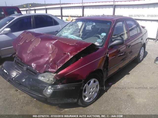 1NXBR12E3YZ331569 - 2000 TOYOTA COROLLA VE/CE/LE RED photo 2