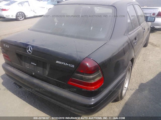 WDBHA33GXXF853408 - 1999 MERCEDES-BENZ C 43 BLACK photo 4