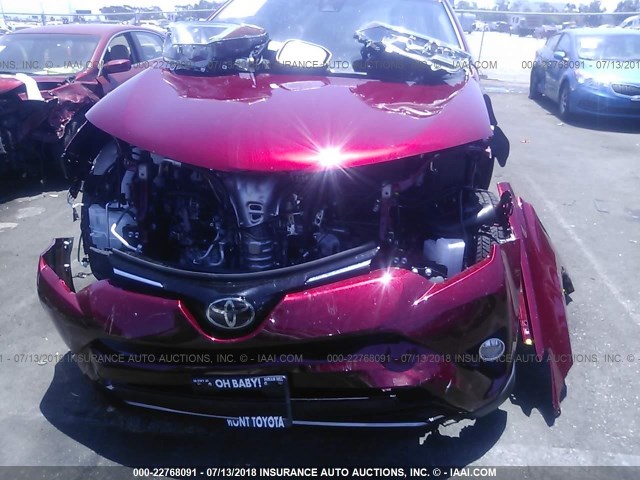 JTMWFREV5JD121487 - 2018 TOYOTA RAV4 ADVENTURE/XLE RED photo 6