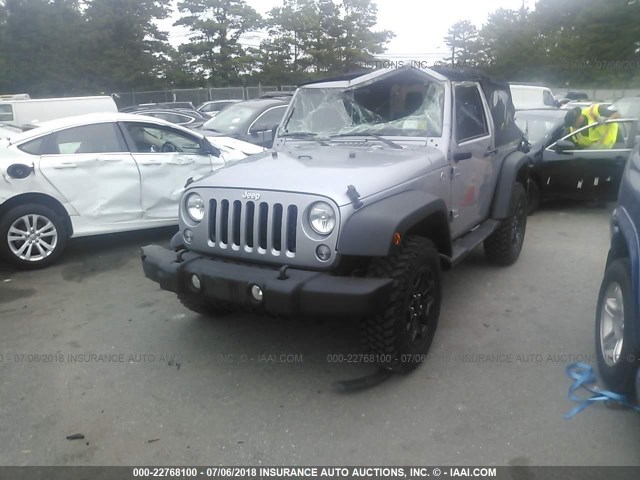 1C4AJWAG5EL142267 - 2014 JEEP WRANGLER SPORT SILVER photo 2