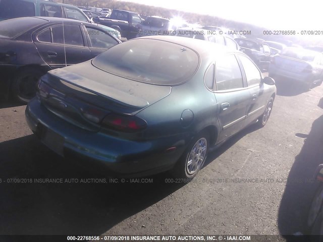 1FAFP52S2WG172652 - 1998 FORD TAURUS LX/SE GREEN photo 4