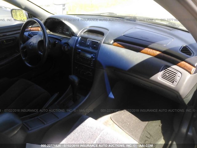 2T1CG22P4YC394523 - 2000 TOYOTA CAMRY SOLARA SE Navy photo 5