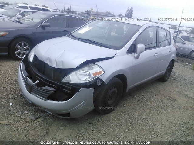 3N1BC13EX9L436239 - 2009 NISSAN VERSA S/SL SILVER photo 2