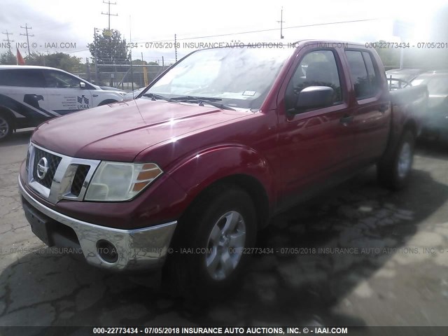 1N6AD07UX9C404370 - 2009 NISSAN FRONTIER CREW CAB SE/LE/NISMO RED photo 2