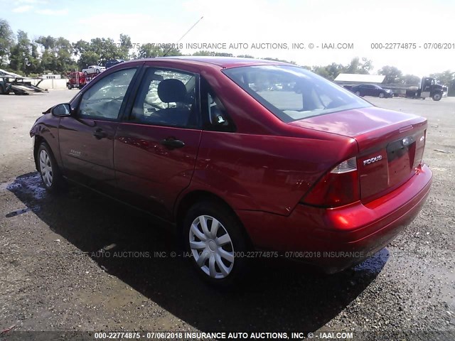 1FAFP34N65W122708 - 2005 FORD FOCUS ZX4 RED photo 3