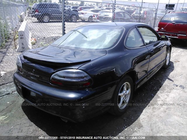 1G2WR1212YF252258 - 2000 PONTIAC GRAND PRIX GTP BLACK photo 4