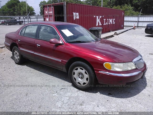1LNHM97V6XY653243 - 1999 LINCOLN CONTINENTAL  Бордовый фото 1