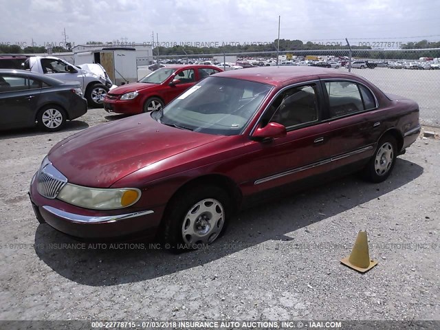 1LNHM97V6XY653243 - 1999 LINCOLN CONTINENTAL  Бордовый фото 2