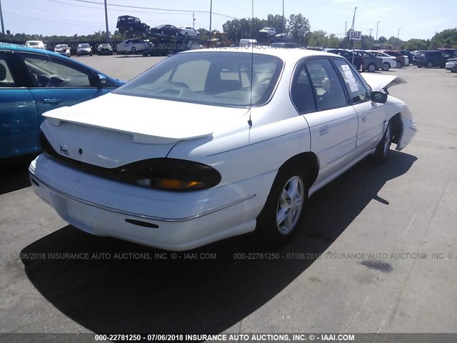 1G2HX52K1XH235582 - 1999 PONTIAC BONNEVILLE SE WHITE photo 4