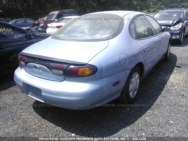 1FALP51U2VG138148 - 1997 FORD TAURUS G Light Blue photo 4