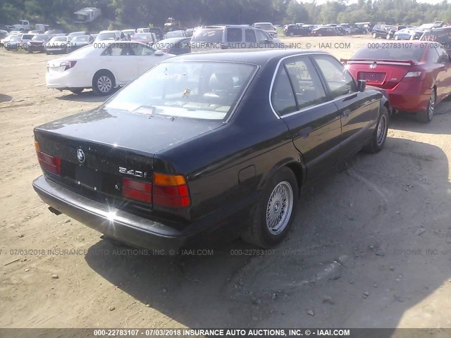 WBAHE6319RGF26661 - 1994 BMW 540 I AUTOMATIC BLACK photo 4