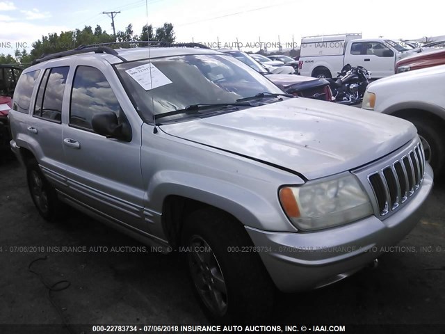 1J8GW68JX2C303438 - 2002 JEEP GRAND CHEROKEE OVERLAND SILVER photo 1