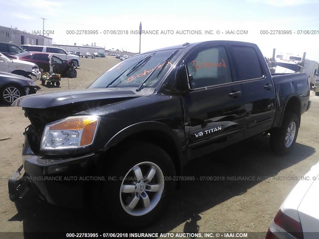 1N6BA0EC9AN310089 - 2010 NISSAN TITAN XE/SE/LE/PRO-4X BLACK photo 2