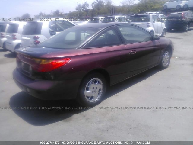 1G8ZY14722Z197615 - 2002 SATURN SC2 BLACK photo 4