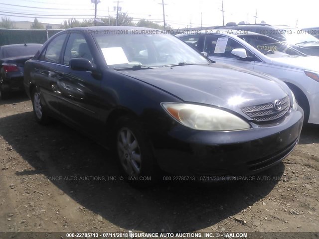 4T1BE30K12U076198 - 2002 TOYOTA CAMRY LE/XLE/SE 黑色 照片 1