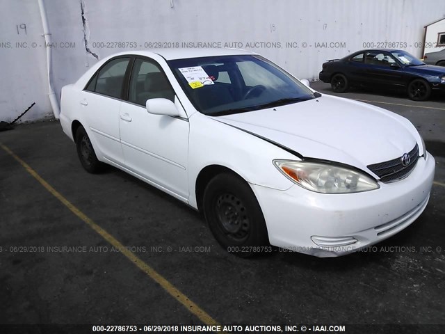 JTDBE32K230140579 - 2003 TOYOTA CAMRY LE/XLE WHITE photo 1