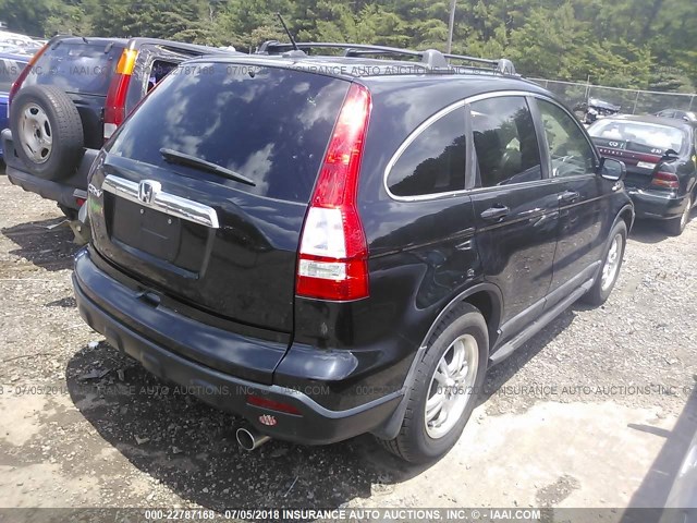 5J6RE38779L011093 - 2009 HONDA CR-V EXL BLACK photo 4