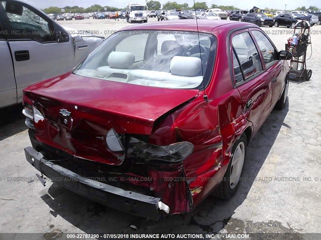 1Y1SK52871Z426506 - 2001 CHEVROLET GEO PRIZM LSI RED photo 4