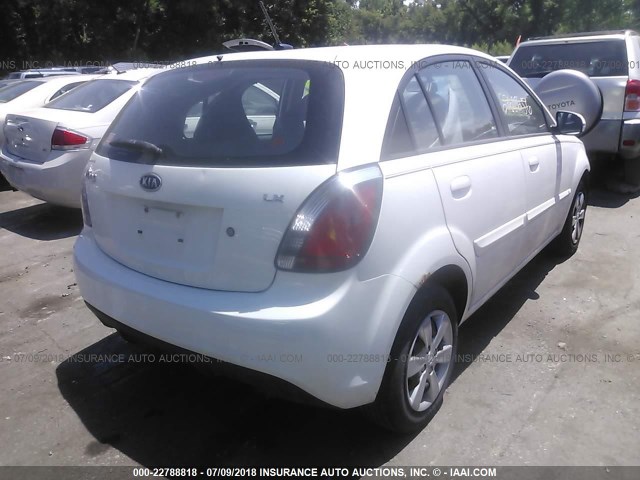 KNADH5A38B6793092 - 2011 KIA RIO LX/SX WHITE photo 4