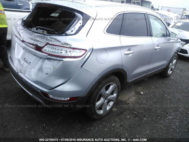 5LMCJ1D99GUJ29892 - 2016 LINCOLN MKC PREMIER SILVER photo 4