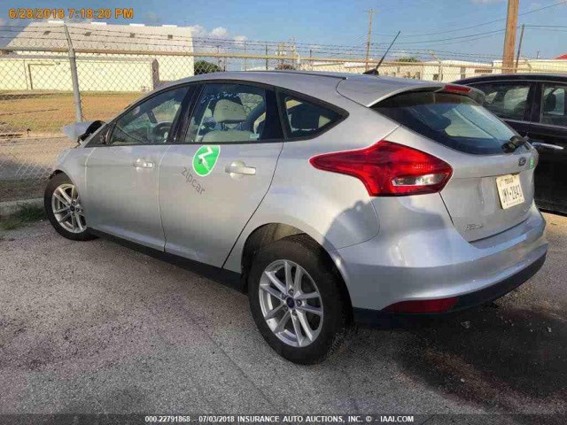 1FADP3K25HL259774 - 2017 FORD FOCUS SE SILVER photo 11