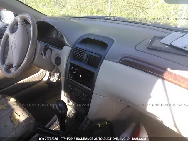 2T1FF28P3YC390258 - 2000 TOYOTA CAMRY SOLARA SE/SLE შავი ფოტო 5