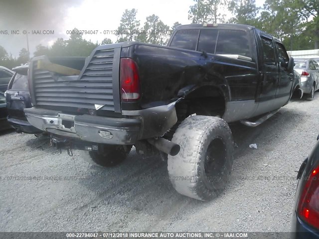 1FTSW31F91EB82927 - 2001 FORD F350 SRW SUPER DUTY BLACK photo 4