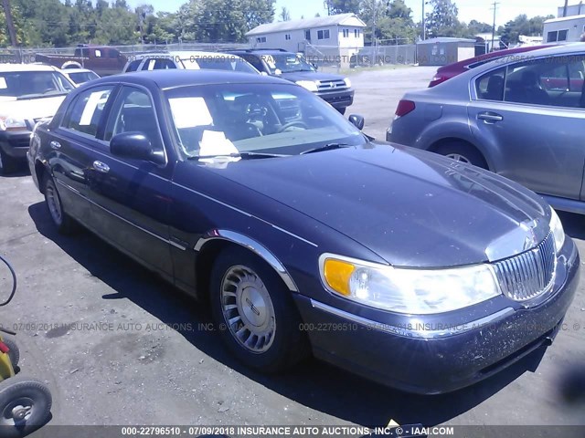 1LNHM81W4XY694210 - 1999 LINCOLN TOWN CAR EXECUTIVE BLUE photo 1