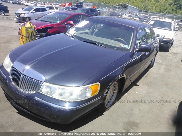 1LNHM81W4XY694210 - 1999 LINCOLN TOWN CAR EXECUTIVE BLUE photo 2
