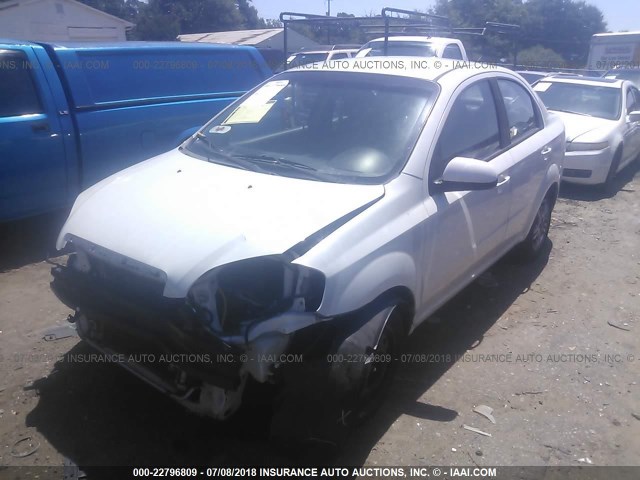 KL1TD5DE0BB257419 - 2011 CHEVROLET AVEO LS/LT WHITE photo 2