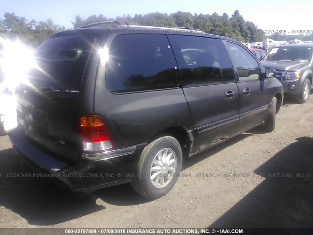 2FMZA5247YBA03243 - 2000 FORD WINDSTAR SE BLACK photo 4