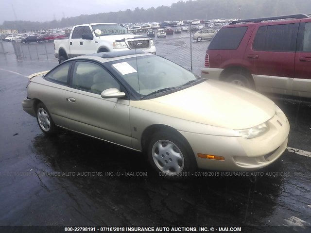 1G8ZG1279VZ148633 - 1997 SATURN SC2 GOLD photo 1