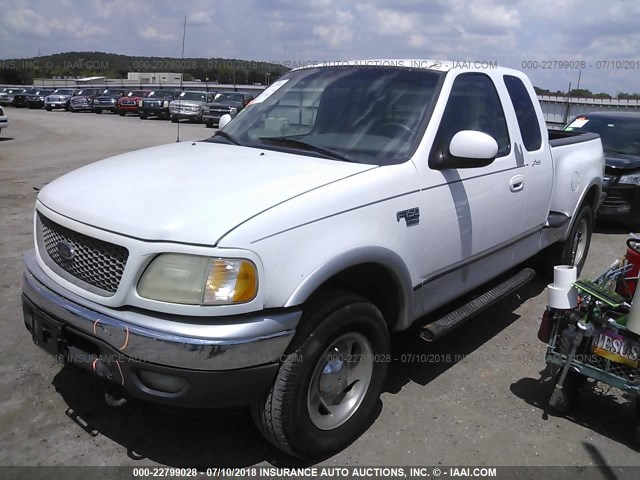 1FTRX08L3YKA02648 - 2000 FORD F150 WHITE photo 2