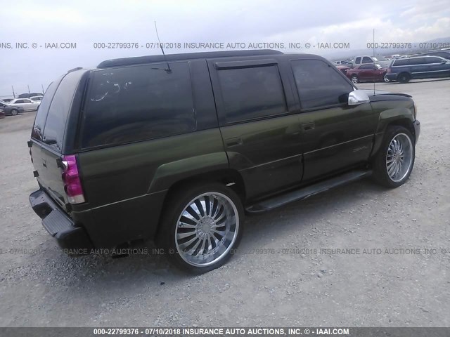 1GKEK63R0YR205147 - 2000 GMC DENALI BLACK photo 4