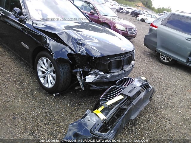 WBAYF4C58DD127493 - 2013 BMW 740 LXI შავი ფოტო 6